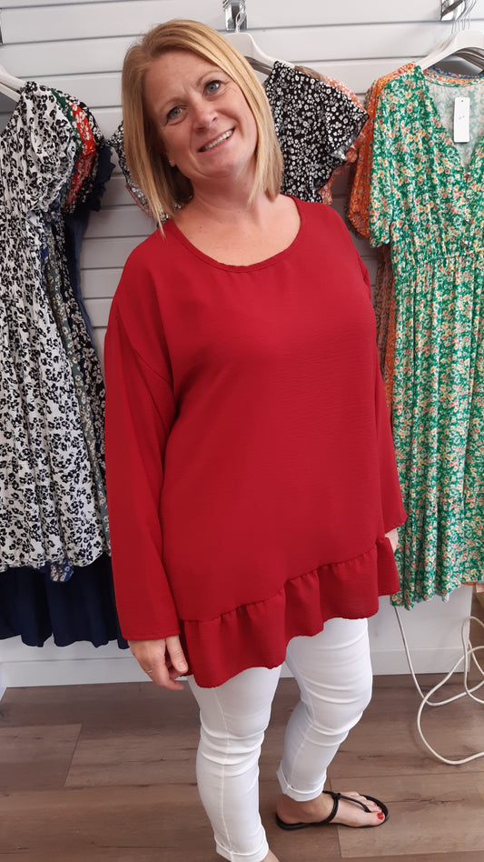 Long Sleeve Round Neck Frill Hem Top.