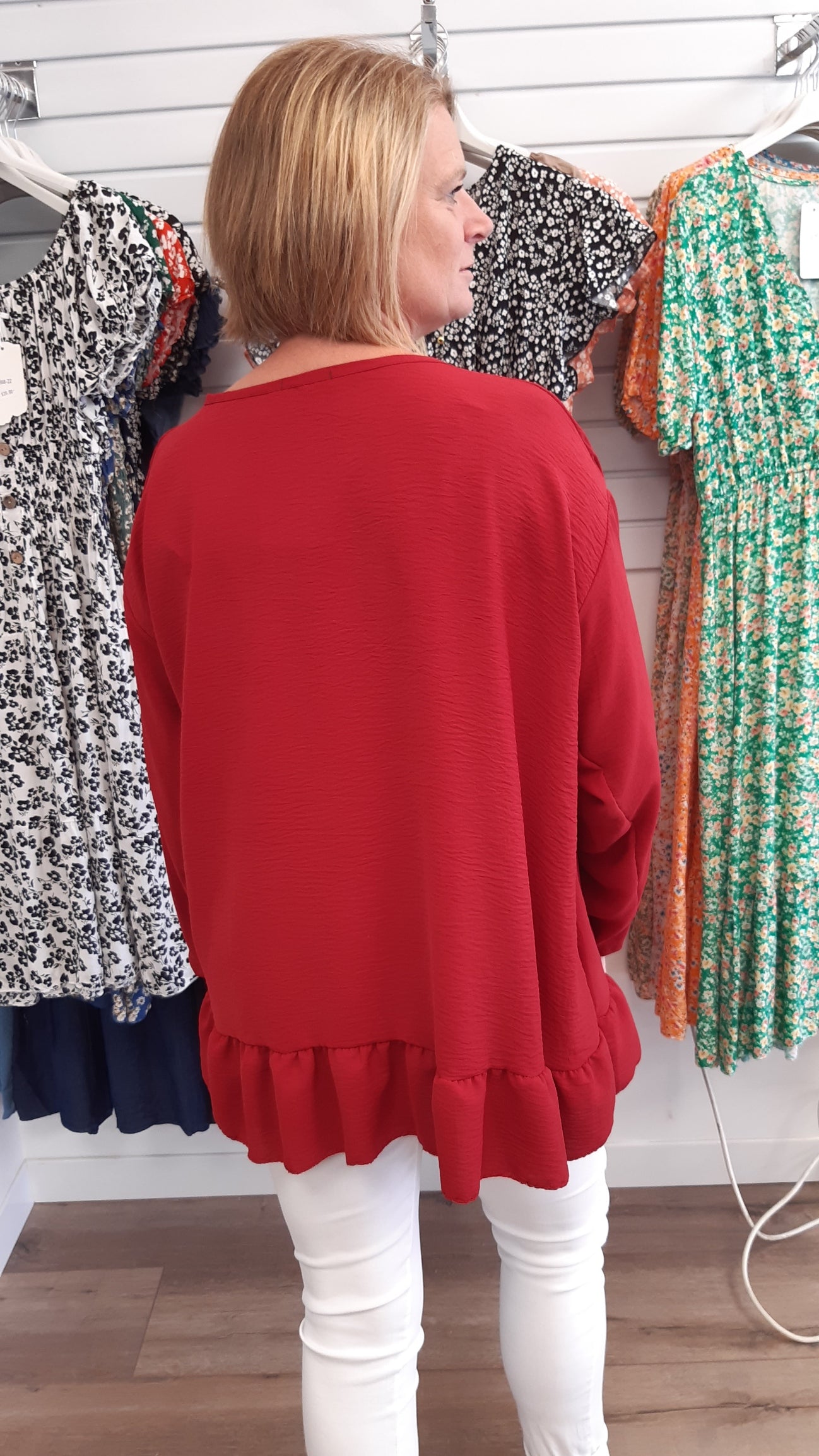 Long Sleeve Round Neck Frill Hem Top.