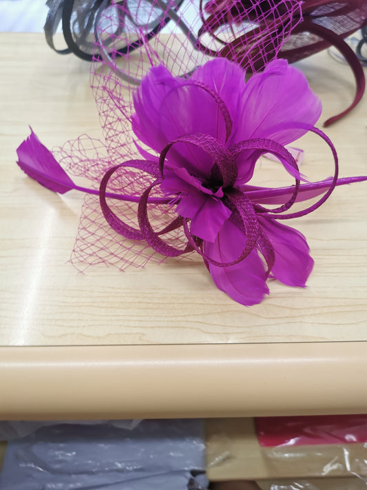 flower Aliceband fascinator with feathers, net and a quill