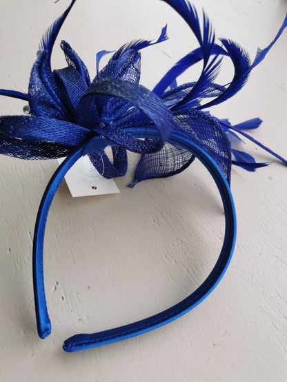 Flower Fascinator on a Satin Alice band with feathers and Clear acrylic stones