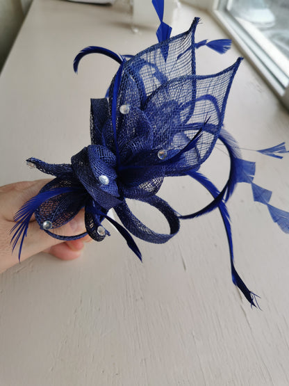Flower Fascinator on a Satin Alice band with feathers and Clear acrylic stones